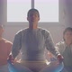 Senior People Meditating in Lotus Position in Gym - VideoHive Item for Sale