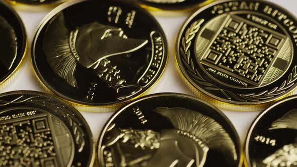Rotating shot of Titan Bitcoins (digital cryptocurrency) - BITCOIN TITAN  alt