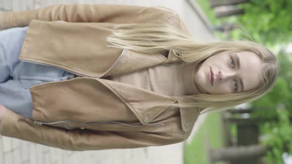 Vertical Video of a Young Skinny Girl in the Park alt