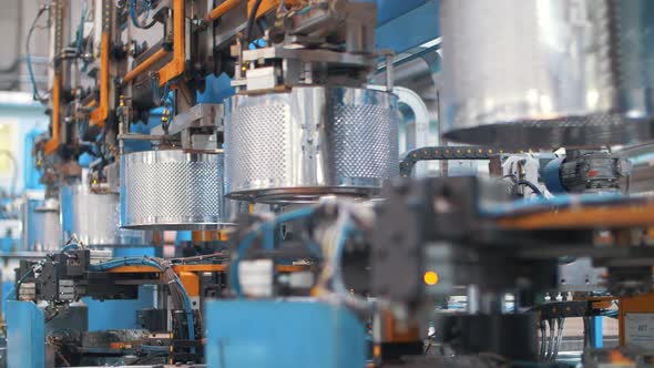 Automatic Machine Producing Drums for Washing Machine at Manufacturing Factory alt