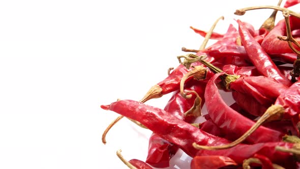 Dried chili rotation isolated on white background with copy space.