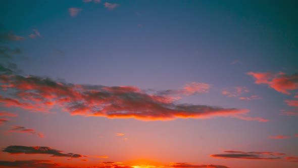 Sunset Cloudy Sky With Fluffy Clouds alt