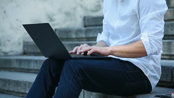 Businessman Typing On Keyboard Laptop.