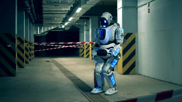 White Robot Disinfects Room. Covid-19, Coronavirus Concept. alt