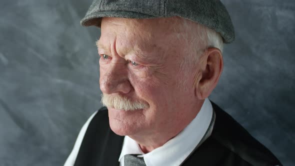 Portrait of Pensive Elderly Man alt