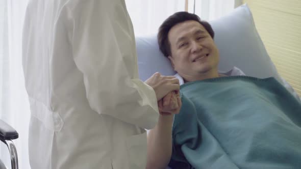 Doctor Take Care of Patient at Hospital or Medical Clinic alt