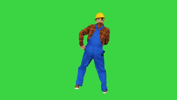 Construction Worker in Helmet Dancing on a Green Screen, Chroma Key alt