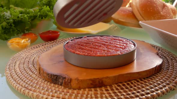 Panorama of the Hand Pressing Minced Meat Into a Form for Making a Meat Cutlet alt