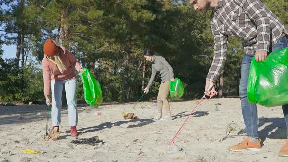 Friends volunteering at the nature. 