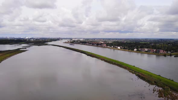 View Of Flood Plain Next To River Noord. Aerial Pedestal Down alt