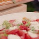 Appetizing Salad With Mozzarella And Tomatoes On Plate - VideoHive Item for Sale