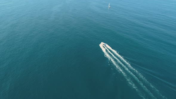 Top View of a White Boat Sailing in the Calm Blue Sea, Bulgaria alt
