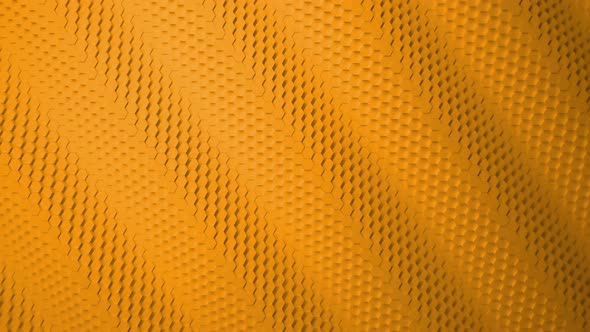 Wave motion mosaic surface with moving orange hexagons.