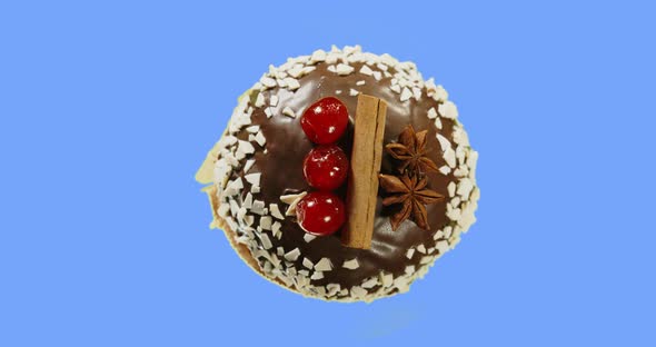  Decorated With Chocolate Glaze, Cherries, Cinnamon And Star Anise. alt