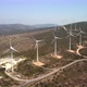 Aerial View Over the Farm Landscape and Wind Turbines Generating Clean Renewable Energy - VideoHive Item for Sale