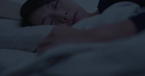 Woman sleep on bed alt