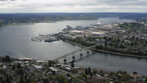 Decommissioned USS Turner Joy Docked Near The Manette Bridge In Bremerton, Washington. aerial alt