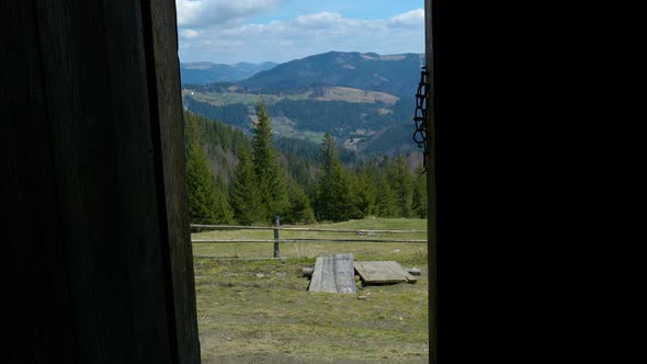 An Open Door Overlooking the Mountain Scenery alt
