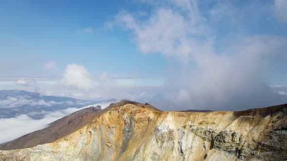 people on the edge of curating a bigger volcano