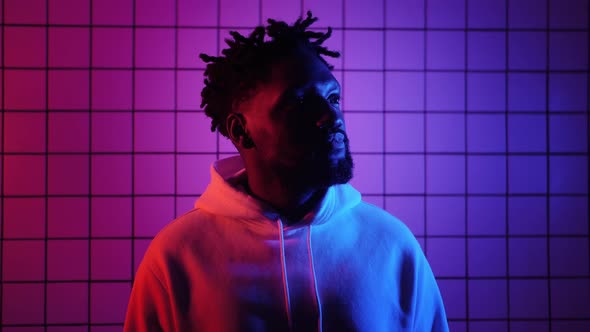 Black Man Listens to Music with Headphones and Dances alt