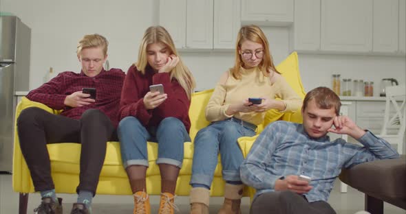 Obessed Teenagers with Phones Ignoring Each Other alt