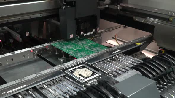 Circut Board machine Produces Printed digital electronic board. alt