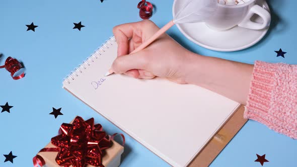 Girl or Woman Writing a Letter to Santa Claus alt