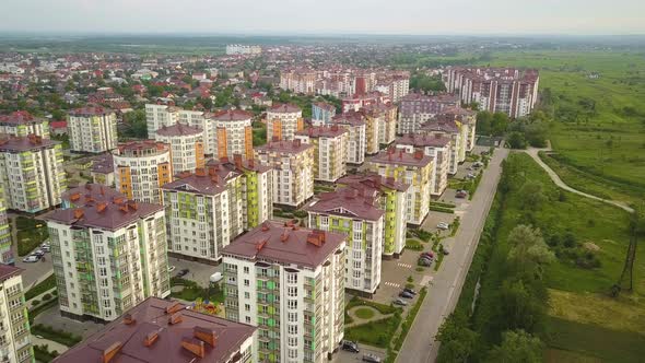 Aerial view of city residential area with high apartment buildings. alt