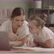 Mother and Daughter Studying Together on Laptop - VideoHive Item for Sale