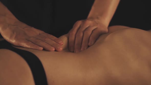 Beautiful Young Woman Gets a Relaxing Massage