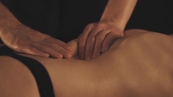 Beautiful Young Woman Gets a Relaxing Massage alt