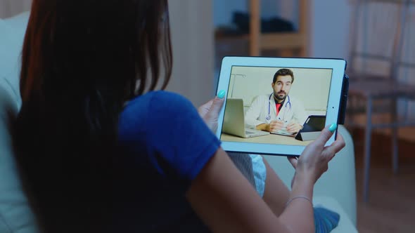 Patient Having Video Conference with Doctor alt