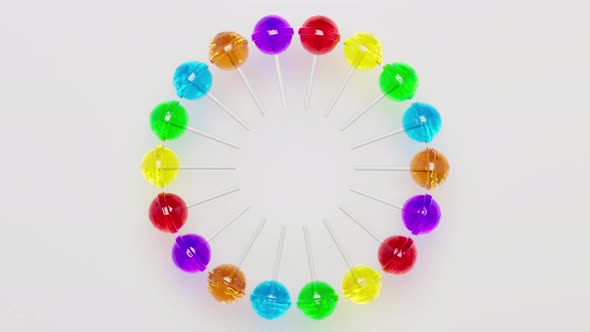 Colorful Looping Pinwheel of 3D Rendered Multicolored Lollipops Over White Background