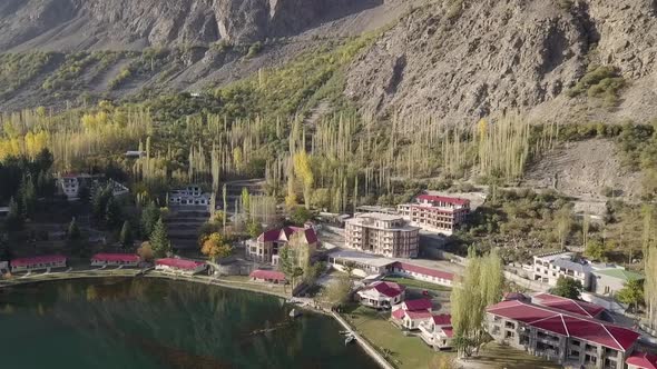 Aerial View Of Shangrila Resort Skardu Beside Lower Kachura Lake. Dolly Forward, Pedestal Down alt