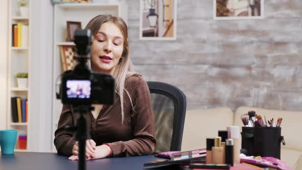 Female Makeup Artist Recording a Vlog How To Use the Right Cosmetics alt