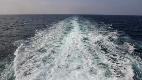 Trail Print on Water Surface Behind of Cruise Ship alt