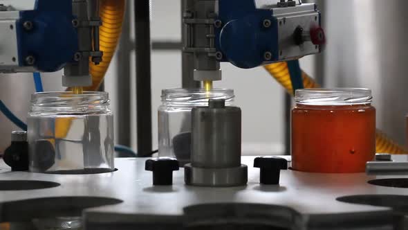 The process of making honey. Pouring,filling honey to jar.  immune system Industrial food alt