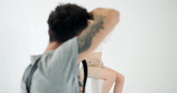 Woman Posing for Photoshoot in Studio