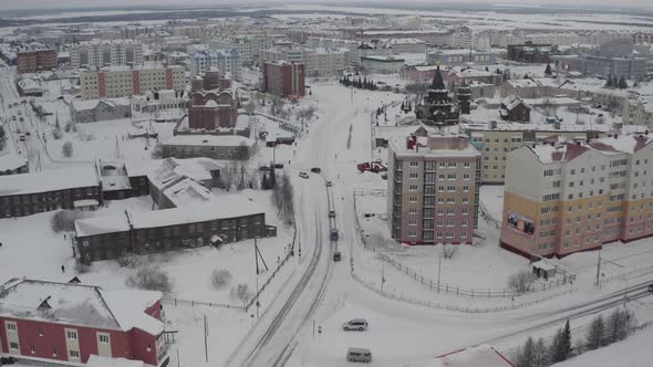 Establishing a Shot of Winter Scenery on the City After Snowfall at the North Pole