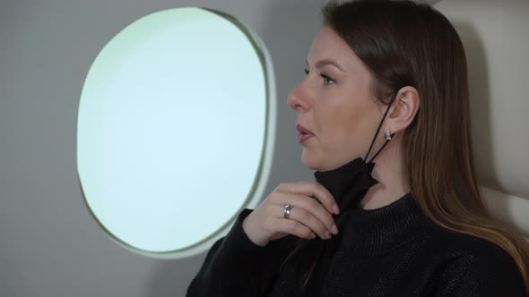 Woman in Airplane Flight