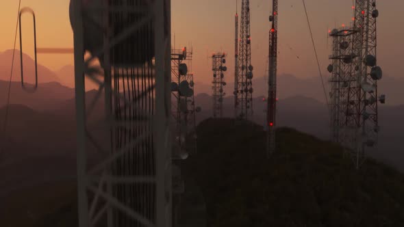 Top of Radio mast supporting antennas. Tall towers for telecommunications.Sunset alt