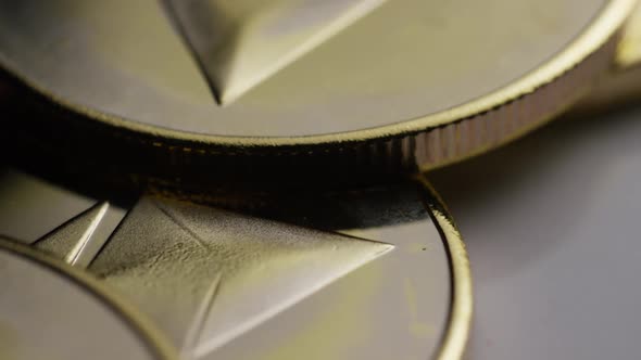 Rotating shot of Ethereum Bitcoins (digital cryptocurrency) - BITCOIN ETHEREUM  alt