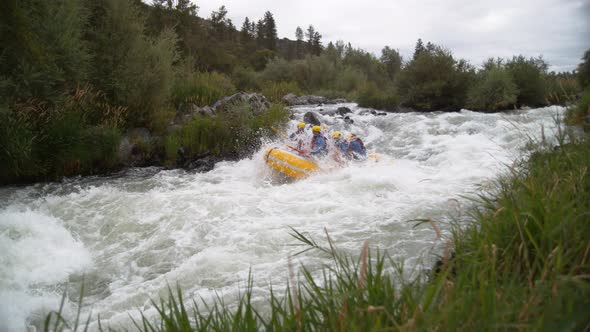 Super slow motion shot of group of people white water rafting, shot on Phantom Flex 4K