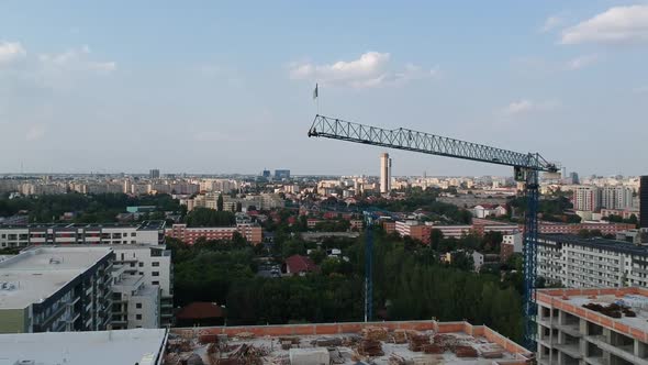 Drone video of a crane with Romanian flag alt