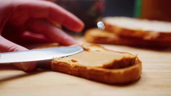 Delicious and Hearty Breakfast Nut Cream on a Crisp Bread alt
