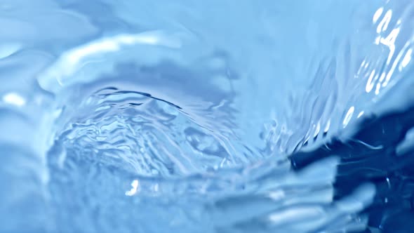 Super Slow Motion Shot of Blue Water Whirl at 1000 Fps alt