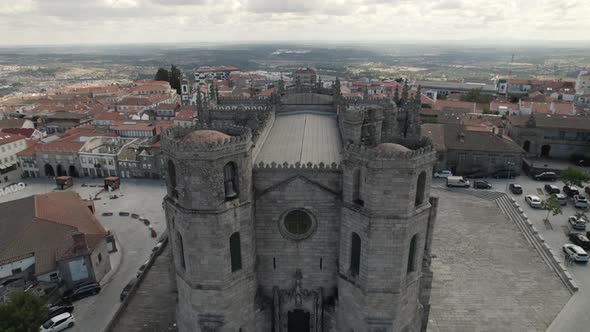 Aerial pullback from Old Cathedral revealing Beautiful Guarda cityscape, Portugal