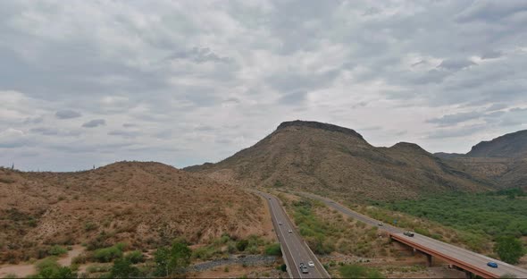 Aerial View Highway Across the Arid Desert Arizona Mountains Adventure Traveling Desert Road alt