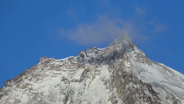 Beautiful Rocky Peaks of Volcano On Sunny Day and Blue Sky