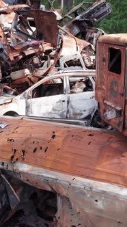 Vertical Video of the War in Ukraine  Destroyed Cars alt